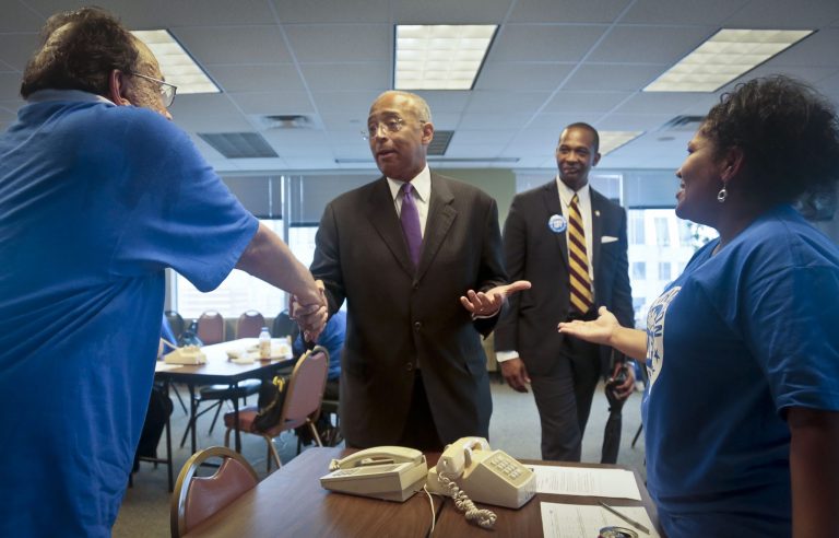 New York mayoral candidate Bill Thompson meet supporters at the offices of the United Federation of Teachers (UTF) union, during a campaign stop in the Borough Hall section of Brooklyn, on Thursday, Aug. 1, 2013 in New York.  Thompson made the stop at UTF, which has endorsed his candidacy, to workers for calling voters as part of his 24-hour citywide tour to get his message out.  The latest poll shows him behind City Council Speaker Christine Quinn and Public Advocate Bill de Blasio.  (AP Photo/Bebeto Matthews)