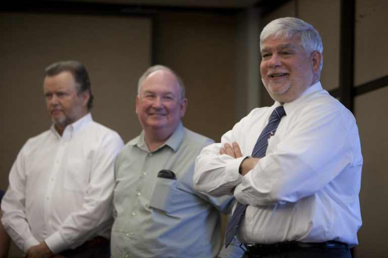 Executive editor Peter Bhatia, right, speaks to the newsroom after The Oregonian was awarded the Pulitzer Prize for its editorial writing about Oregon's troubled Public Employee Retirement System, better known as PERS on Monday, April 14, 2014 in Portland, Ore. The prize was the third in the newspaper's history for editorial writing. (AP Photo/The Oregonian, Beth Nakamura)