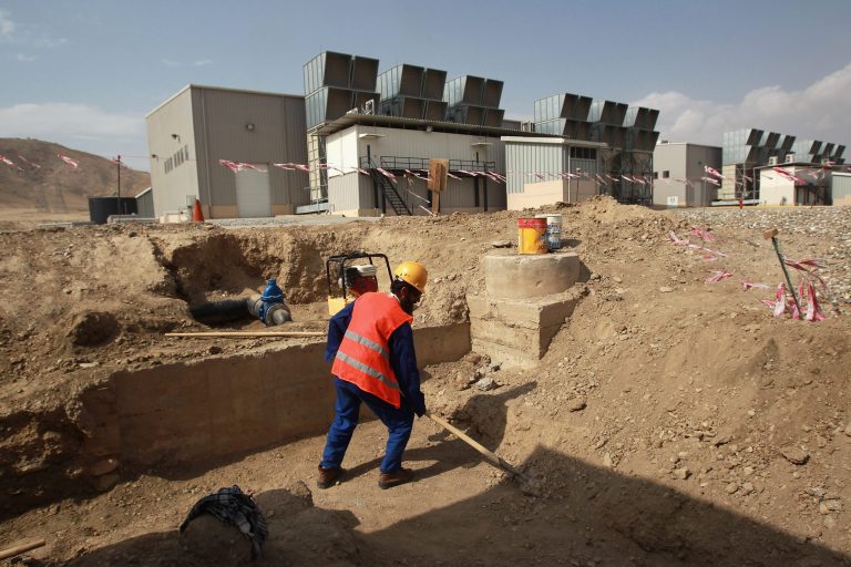 A laborer works on the grounds of the American-built 105MW Tarakhil Power Plant on September 8, 2011 in Tarakhil, Afghanistan, on the outskirts of Kabul. (Photo by John Moore/Getty images)