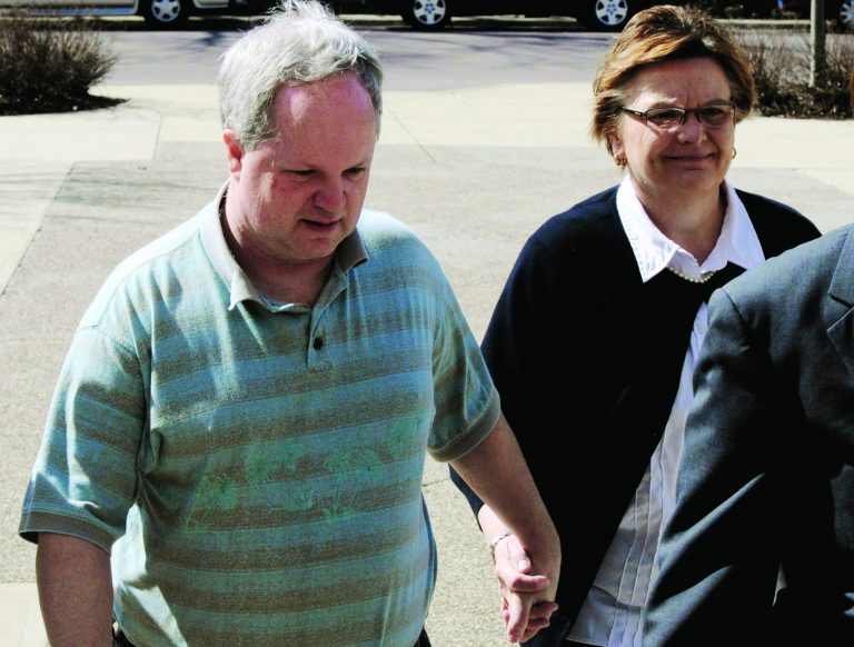 FILE - In this May 4, 2011, file photo, William Melchert-Dinkel arrives at the Rice County Courthouse in Faribault, Minn., with his wife, Joyce, for his sentencing. The Minnesota Court of Appeals on Tuesday, July 17, 2012, affirmed the convictions of the former nurse who was found guilty of aiding the suicides of two people. (AP Photo/Jim Mone, File)