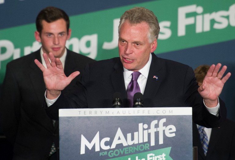 Democratic Virginia Gov.-elect Terry McAuliffe addresses supporters during his election victory party in Tysons Corner, Va., on Tuesday night. McAuliffe defeated Republican Ken Cuccinelli, the state's attorney general, as well as a Libertarian candidate. (AP Photo/Cliff Owen)