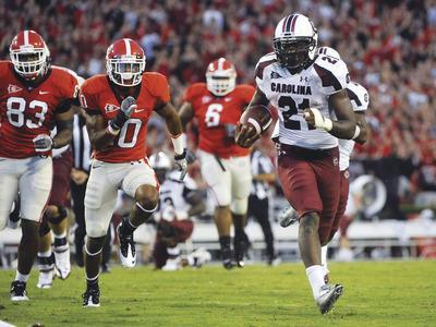John Amis/AP
Marcus Lattimore rushed for 176 yards last week against Georgia and has 23 touchdowns in 15 career games at South Carolina.