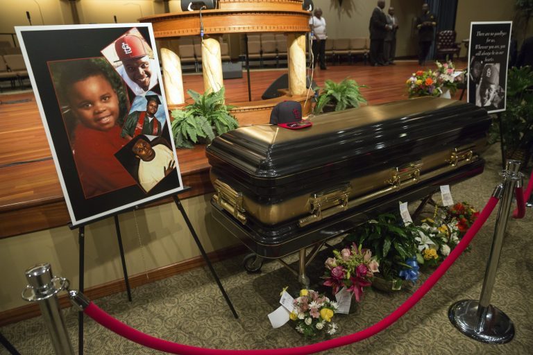 The casket of Michael Brown is seen at Friendly Temple Missionary Baptist Church in St. Louis, Monday, before his funeral. (AP Photo/New York Times, Richard Perry)