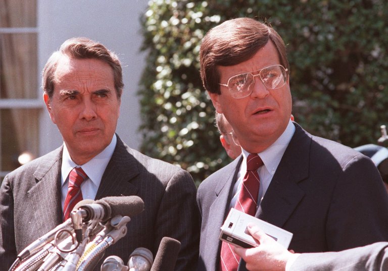 Senate Majority Leader Bob Dole, left, R-Kans., and Senate Majority Whip Trent Lott talk to reporters on the White House lawn April 26, 1986, after meeting with President Reagan. (AP Photo)Â 