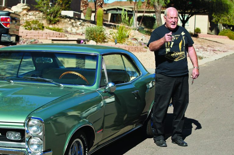 Jerry Meltzer, talks about his neighbor, Matthew Good, as he stands in front of the house where Good lives, Monday Dec. 10, 2012, in Fountain Hills, Ariz. The second winner of the $587.5 million Powerball jackpot is the 37-year-old Good, who chose to remain anonymous, took the one-time payout of $192 million from the Nov. 28 drawing.(AP Photo/Ross D. Franklin)