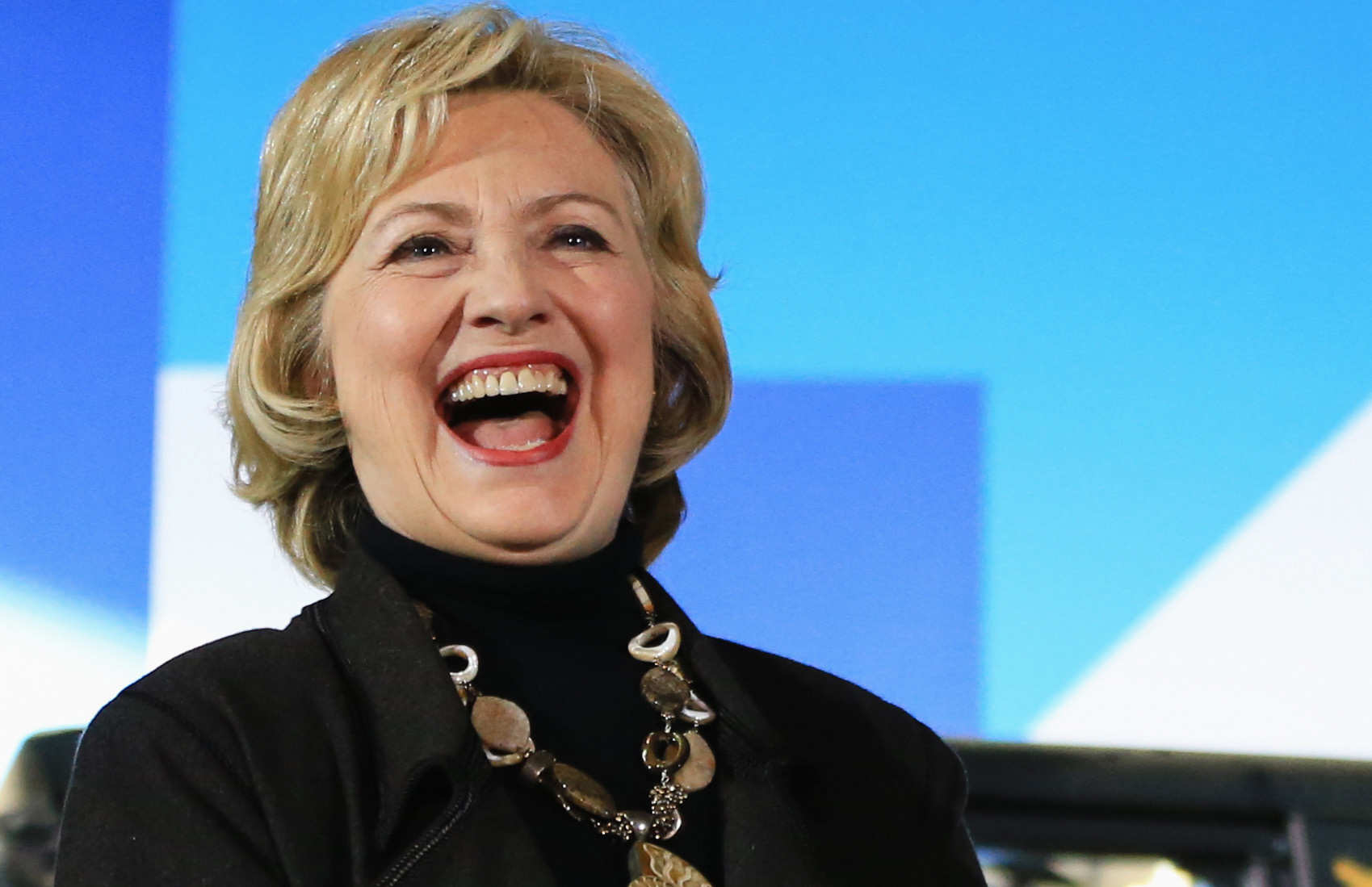 Clinton can’t help laughing at Bush and Trump