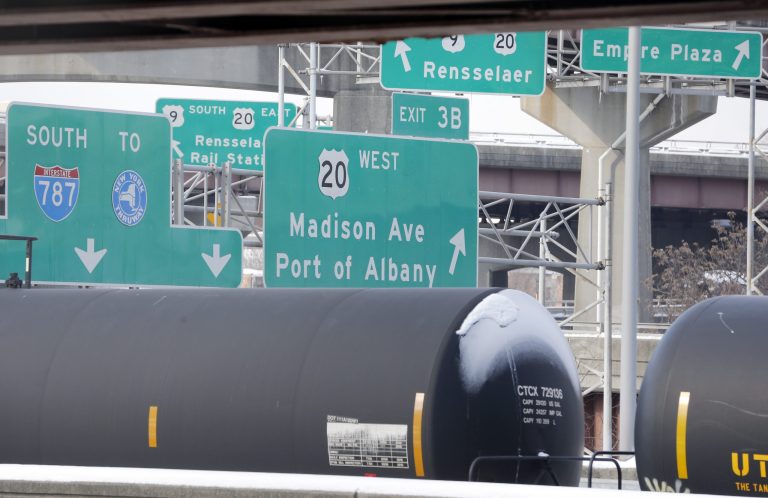 Railroad oil tanker cars are parked along Interstate 787 in downtown Albany, N.Y., on Friday, Feb. 7. (AP Photo/Mike Groll)