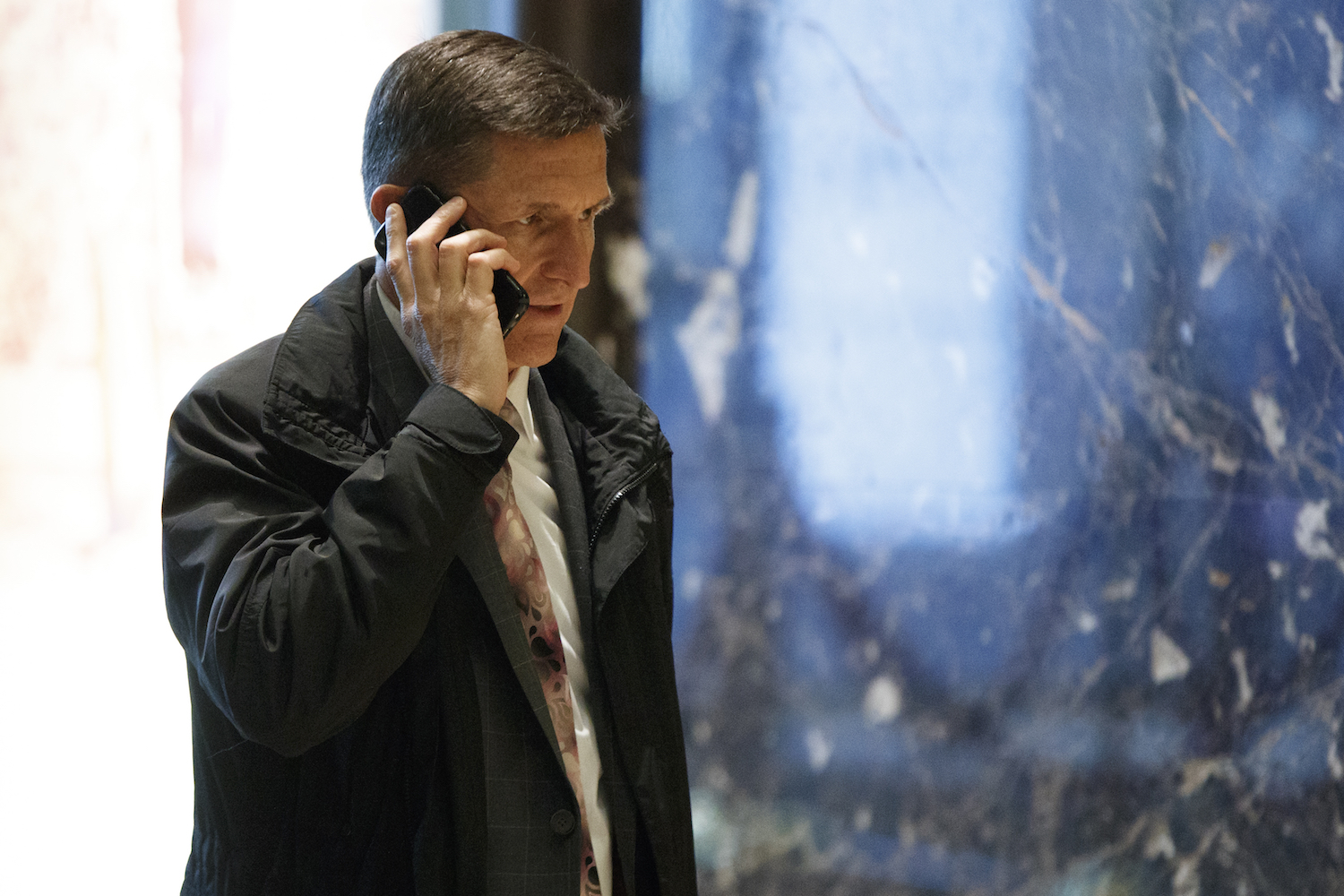 Democratic lawmakers want Flynn suspended and investigated over Russia contacts