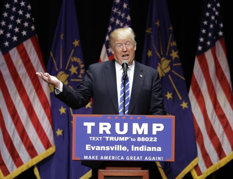 Analysts are suggesting the list of toss-up seats could expand even further if voters link GOP candidates to Donald Trump. (AP Photo)