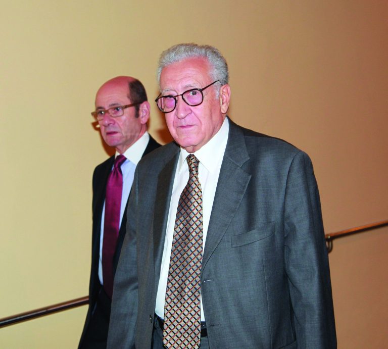 Lakhdar Brahimi, right, joint special representative for Syria, arrives at closed door consultations regarding the situation in Syria at the Security Council at United Nations headquarters Monday, Sept. 24, 2012. (AP Photo/David Karp)