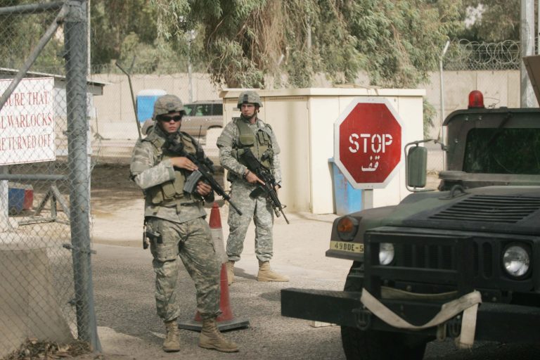 U.S. Military security forces guard the entrances to the U.S. Embassy in Baghdad. (AP/Pablo Martinez Monsivais)