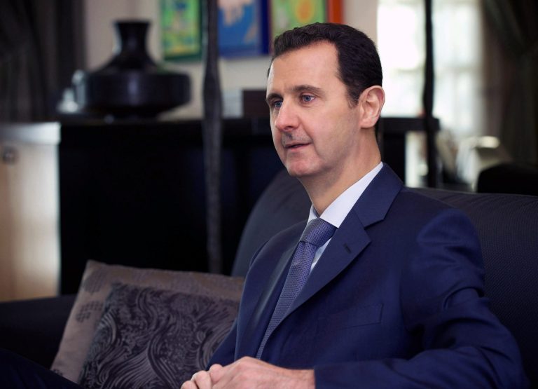 Syrian President Bashar Assad speaks during an interview with a U.S. magazine, Monday, Jan. 26, 2015. Assad has dismissed negotiations with 