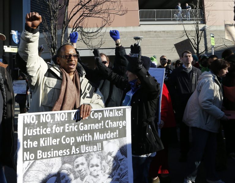 Americans of all races and political stripes reacted with outrage at the videotaped choke-hold that led to the death of Eric Garner in Staten Island. And there is almost no racial divide in public opinion regarding the outrageous videotaped police shooting of the unarmed, fleeing Walter Scott in South Carolina. (AP Photo)