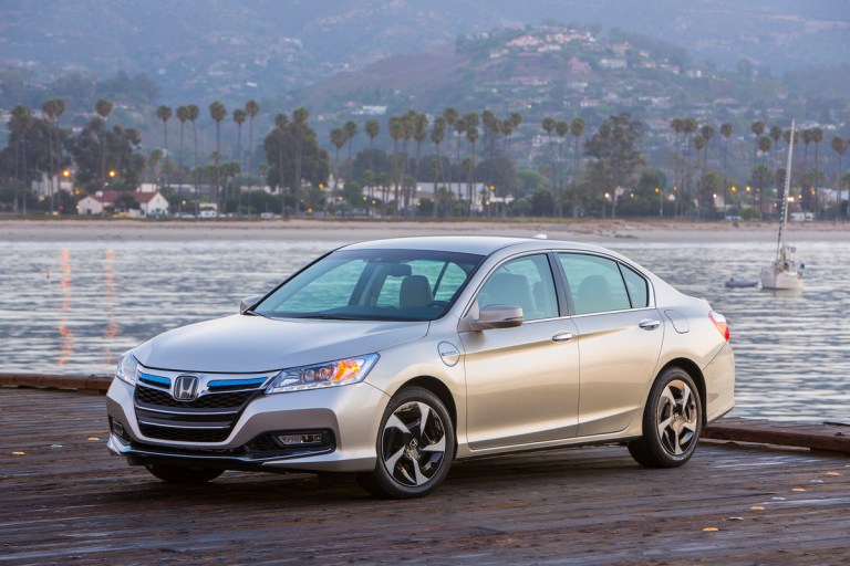 This undated product image provided by Honda shows the 2014 Honda Accord Plug-in Hybrid vehicle. The fuel-thrifty Accord four door, the first with an electric plug, is propelled by stored electric power on most short trips of up to 13 miles. (AP Photo/Honda)