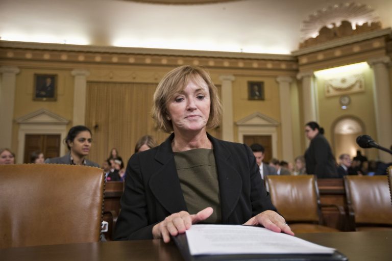 Marilyn Tavenner, the administrator of the Centers for Medicare and Medicaid Services prepares to testify on Capitol Hill in Washington, Tuesday, Oct. 29, 2013, before the House Ways and Means Committee hearing on the implementation of the Affordable Care Act. Stressing that improvements are happening daily, the senior Obama official closest to the administration's malfunctioning health care website apologized Tuesday for problems that have kept Americans from successfully signing up for coverage. (AP Photo/J. Scott Applewhite)