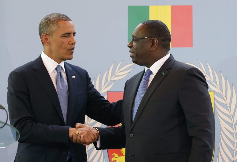 President Obama shakes hands with Senegalese counterpart Macky Sall following a joint press conference at the presidential palace in Dakar, Senegal,  on Thursday. (AP/Rebecca Blackwell)