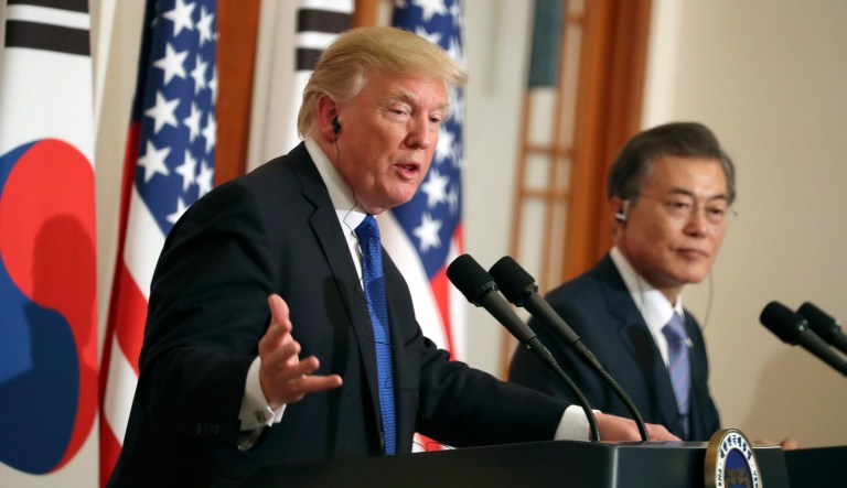 President Donald Trump, left, speaks as South Korean President Moon Jae-in looks on in a joint news conference at the Blue House in Seoul, South Korea, Tuesday, Nov. 7, 2017. President Trump began his two-day Korean peninsula visit Tuesday walking amid weapons of war but voicing optimism for peace. Trump is on a five country trip through Asia traveling to Japan, South Korea, China, Vietnam and the Philippines. (AP Photo/Andrew Harnik)