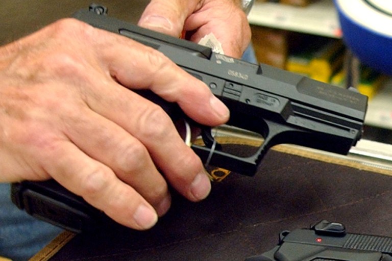 One of the guidelines is that when on campus, no part of the gun can be visible and the holster must protect the trigger. No bullet can be in the guns chamber, either. (AP File Photo/Jim Mone)