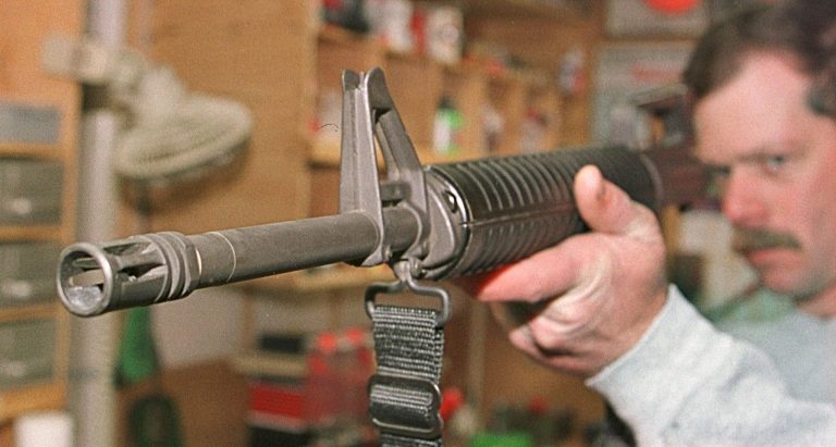 386509 01: Wright Gibb looks down the barrel of an AR-15 assault rifle after cleaning it March 8, 2001 at his residence in Westminster, Co. Gibb bought a gunsafe to store his 40 plus guns after the Columbine High School shootings. Gun owners across the country are becoming aware of the necessity of securing their weapons in light of the series of recent shootings at schools. (Photo by Michael Smith/Newsmakers)