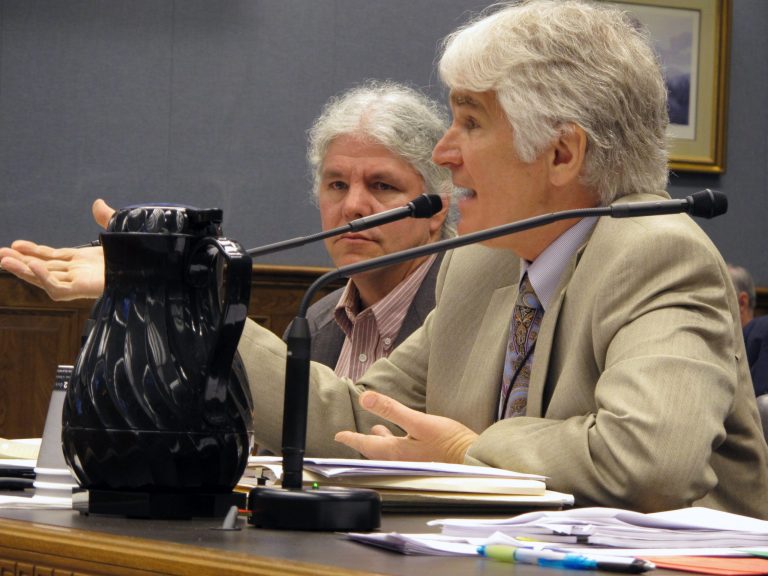 Carl Redman, executive editor of The Advocate newspaper, speaks in support of a bill that would expand access to governor's office records on Tuesday, April 30, 2013, in Baton Rouge, La. Bill proponent Brad Ott looks on as Redman speaks. The House and Governmental Affairs Committee voted 6-3 against the bill. (AP Photo/Melinda Deslatte)