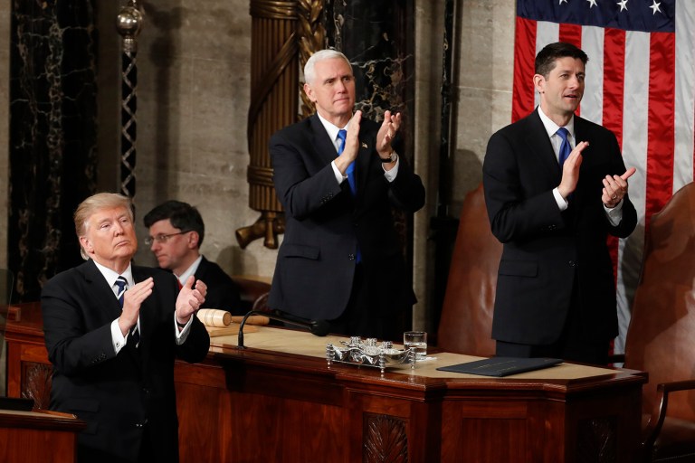 President Trump, Vice President Mike Pence and House Speaker Paul Ryan of Wis. applaud Carryn Owens, widow of widow of Chief Special Warfare Operator William 