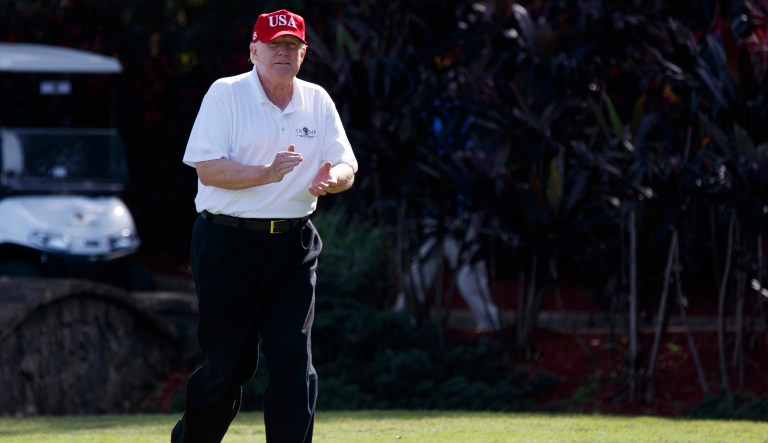 The longer Trump hits the links, the less likely Trump will be to step on a political rake. (AP Photo/Evan Vucci, File)