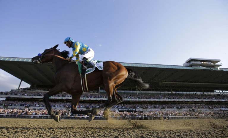 In the wake of American Pharoah's historic Triple Crown victory, it's also an opportune time to open up a national discussion about the state of horse racing. (AP Photo)Â 