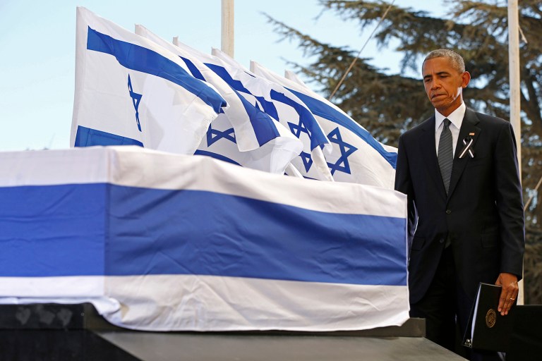 President Obama looks at the coffin of former Israeli President Shimon Peres during his funeral in Jerusalem, Israel. (Abir Sultan/Pool photo via AP)
