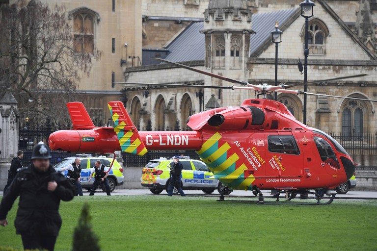 An Air Ambulance on the scene after sounds similar to gunfire have been heard close to the Houses of Parliament, London. The UK House of Commons sitting has been suspended as witnesses report sounds like gunfire outside. (Victoria Jones/PA via AP)