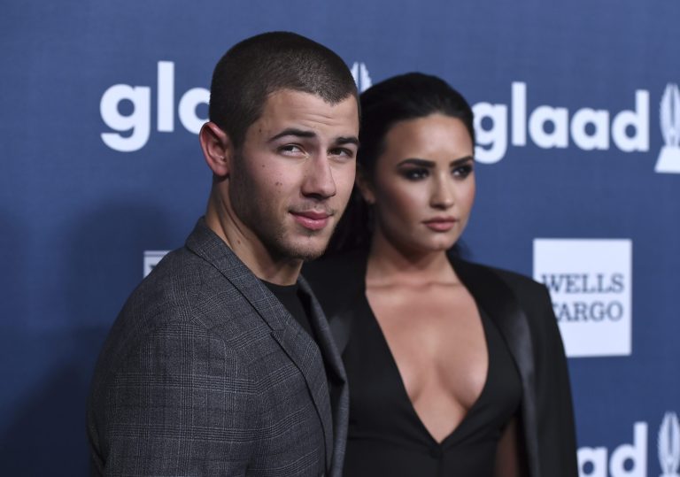 Nick Jonas and Demi Lovato decided to cancel their June 30 show in Charlotte and July 2 show in Raleigh, N.C. to protest a new law that many say discriminates against transgender people. (Photo by Jordan Strauss/Invision/AP)