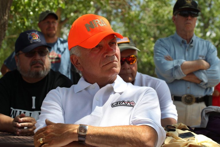 Colorado candidate for governor Tom Tancredo wears an NRA hat during a gun rights rally in Aurora, Colo., on July 19. (AP/Brennan Linsley)