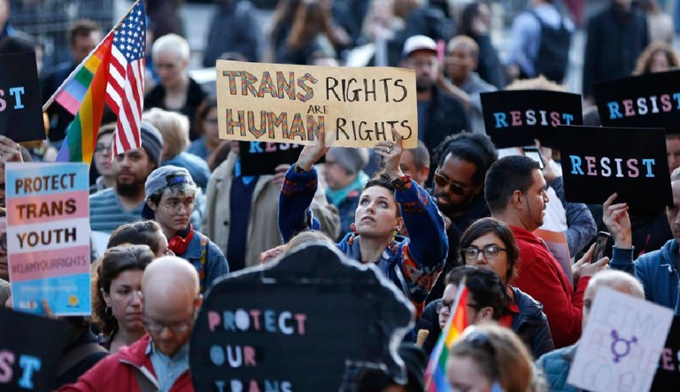 A judge ruled that transgender people will be allowed to join the military starting Jan. 1. The ruling Monday was another legal setback for President Trump's effort to ban transgender troops and roll back the open service policy enacted by the Obama administration. (AP Photo/Kathy Willens)