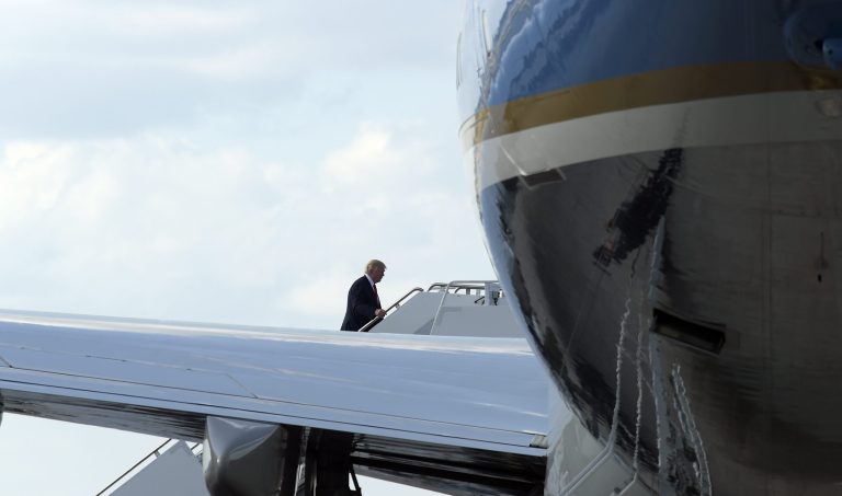 President Donald Trump walks up the steps of Air Force One at Palm Beach International Airport in West Palm Beach, Fla., Monday, Feb. 20, 2017. (AP Photo/Susan Walsh)