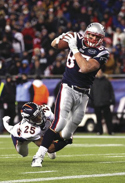 Al Bello/Getty Images
Rob Gronkowski set a single-season tight end record with 17 touchdowns this season.