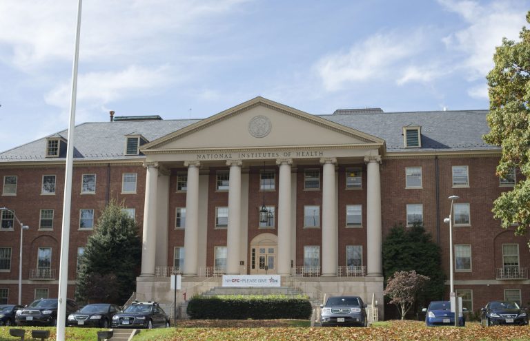 The National Institutes of Health James Shannon building on the campus of NIH in Bethesda, Md., Friday, Oct. 24, 2014. (AP Photo/Pablo Martinez Monsivais)