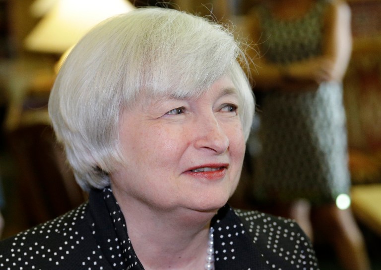In this Thursday, Aug. 21, 2014 photo, Federal Reserve Chair Janet Yellen arrives for a dinner during the Jackson Hole Economic Policy Symposium at the Jackson Lake Lodge in Grand Teton National Park near Jackson, Wyo. Yellen will be pressed to clarify the Fed's intentions after the Fed issues its policy statement on Wednesday, Sept. 17, 2014. (AP Photo/John Locher)