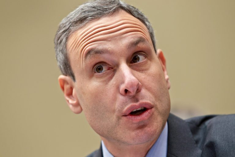 FILE - In this Aug. 2, 2012 file photo, Internal Revenue Service (IRS) Commissioner Douglas Shulman testifies on Capitol Hill in Washington, before the House Oversight Committee. The Internal Revenue Service inappropriately flagged conservative political groups for additional reviews during the 2012 election to see if they were violating their tax-exempt status, a top IRS official said Friday. (AP Photo/J. Scott Applewhite)