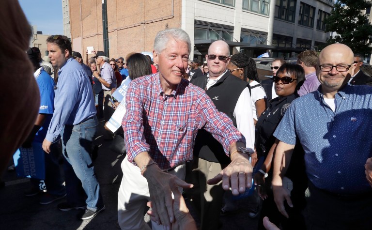 Clinton attacked Trump, whose own foundation has been fined by the IRS for illegally contributing funds. (AP Photo/Carlos Osorio)