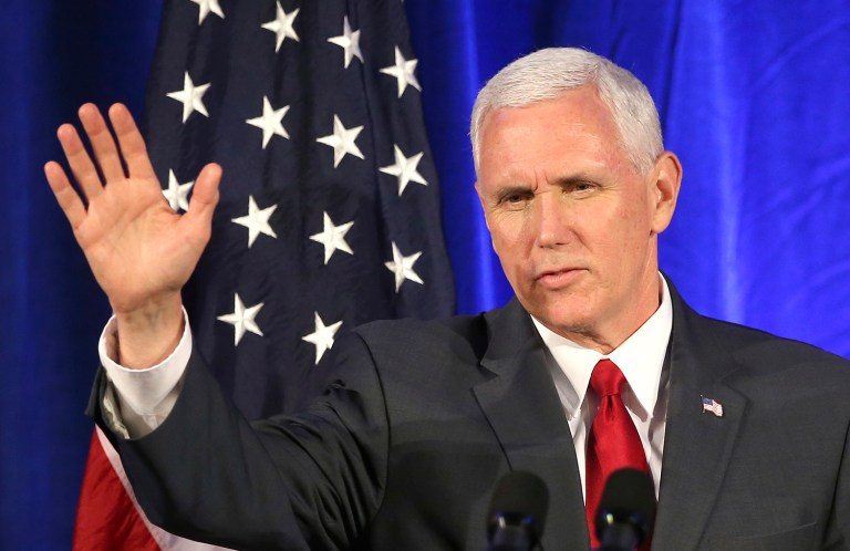 Vice President Mike Pence is cutting short an overseas trip to return to Washington to help President Trump pass a spending bill to keep the government fully open past Friday. (AP Photo/Rick Rycroft)