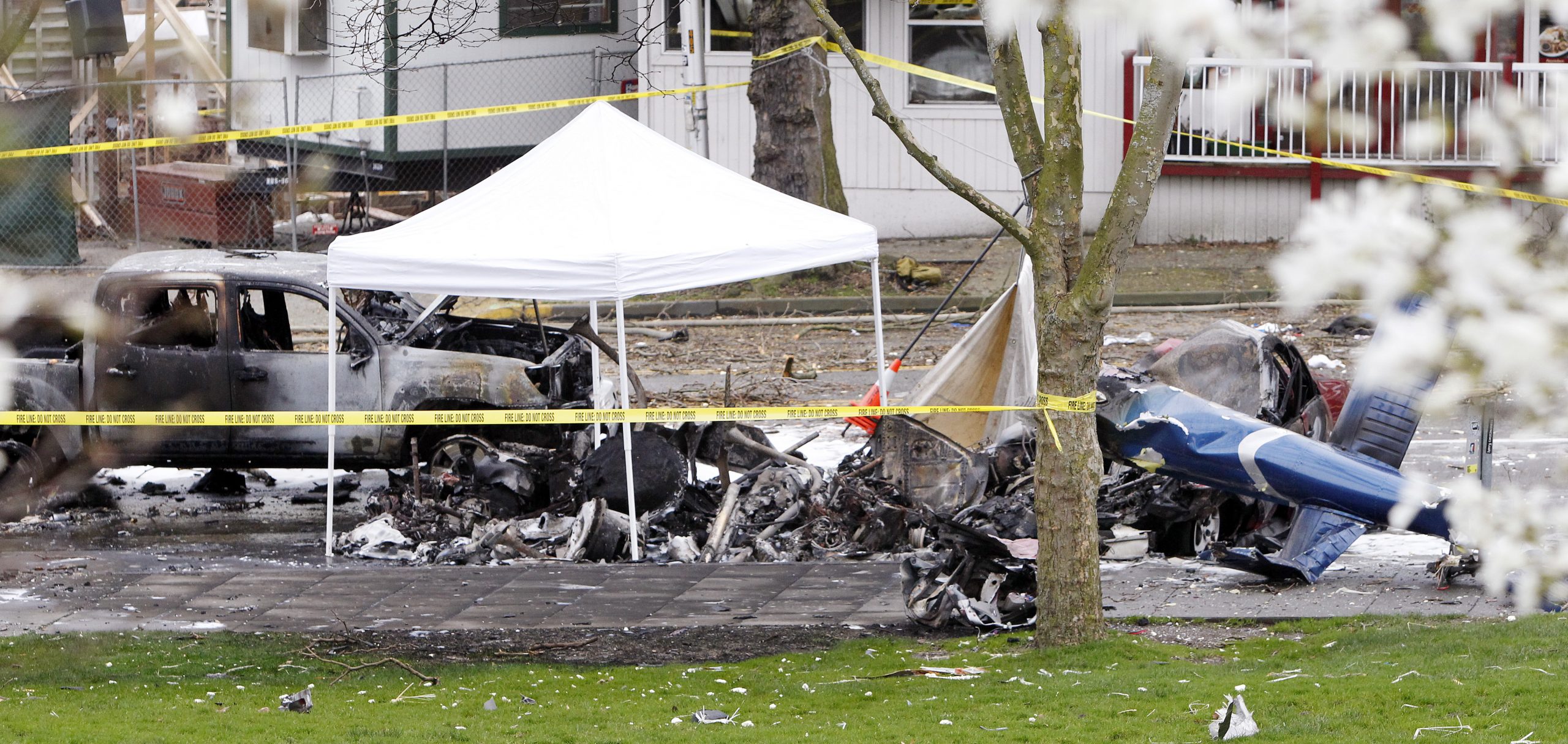 Investigators comb scene of deadly chopper crash