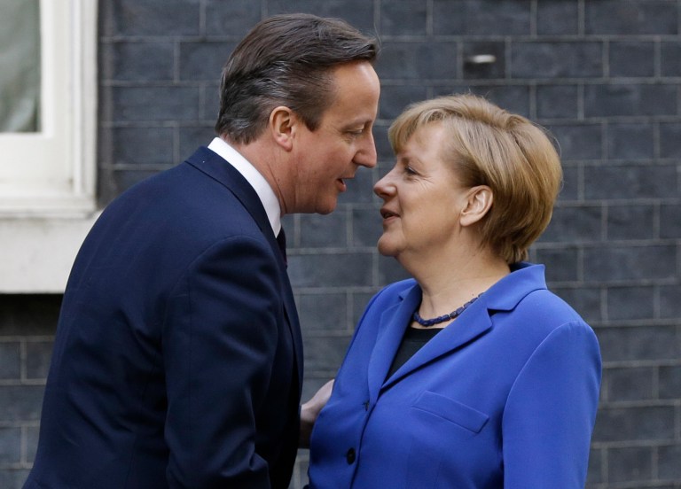 Britain's Prime Minister David Cameron greets Germany's Chancellor Angela Merkel at Downing Street in London, Thursday, Feb. 27, 2014. (AP Photo/Kirsty Wigglesworth)
