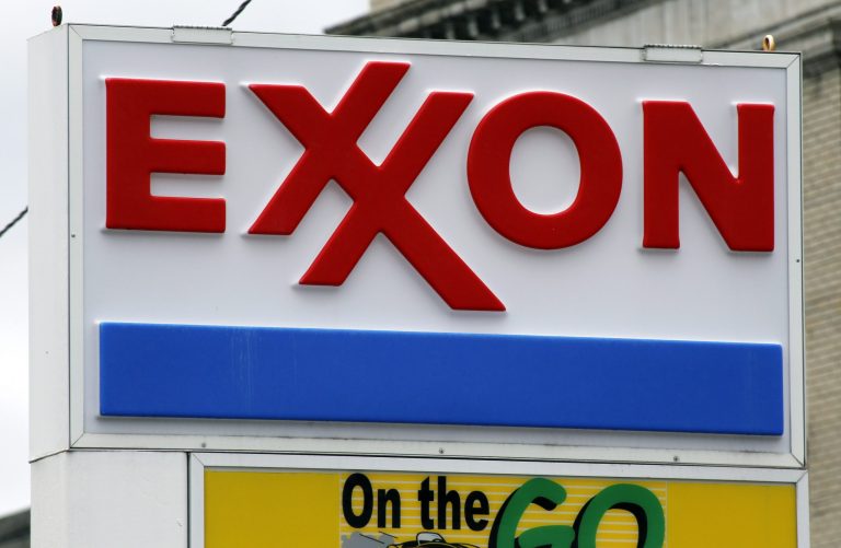 Standard & Poor's Ratings downgraded Exxon Mobil's triple-A credit rating that the oil giant has held since 1930. (AP Photo/Gene J. Puskar, File)