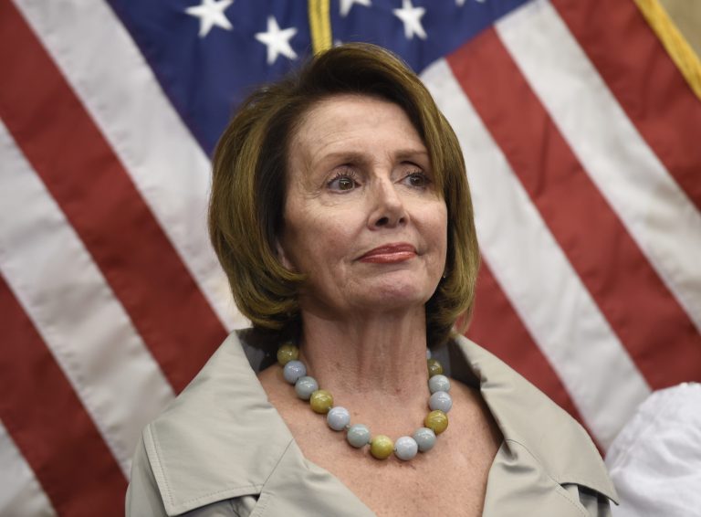 House Minority Leader Nancy Pelosi, she is willing to back a Senate version that would last until Dec. 11. (AP Photo)