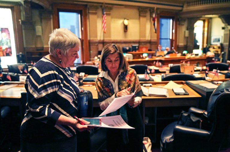 Colorado Democratic state Sen. Mary Hodge, left, has proposed a bill requiring landowners and buyers to be better informed about their property rights, which often doesn't include mineral rights below the surface. (AP Photo/Brennan Linsley)