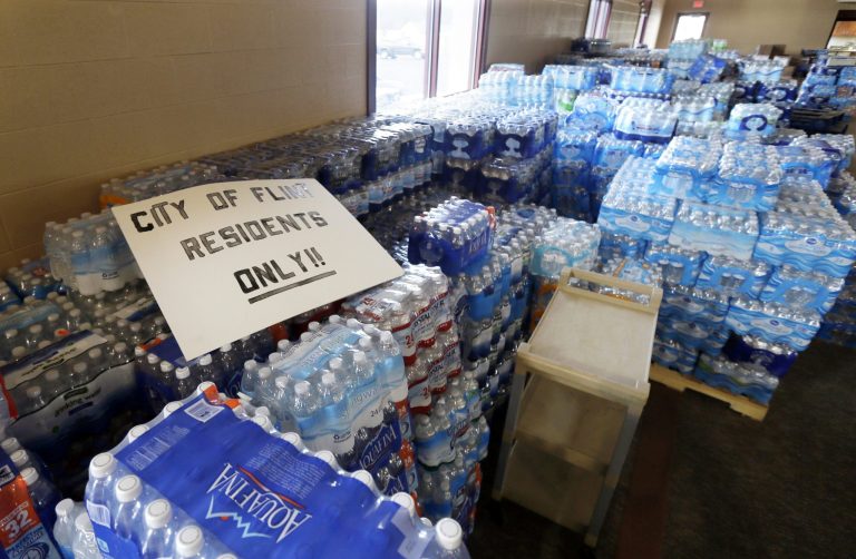 Hundreds of cases of bottled water are stored at a church in Flint, Mich., on Feb. 5, 2016. The Water Infrastructure Flexibility Act would help tackle a nationwide problem that led to a scandal in Flint — where ancient lead pipes corroded into the city's drinking water after the city government decided to switch water sources. (AP Photo/Carlos Osorio)