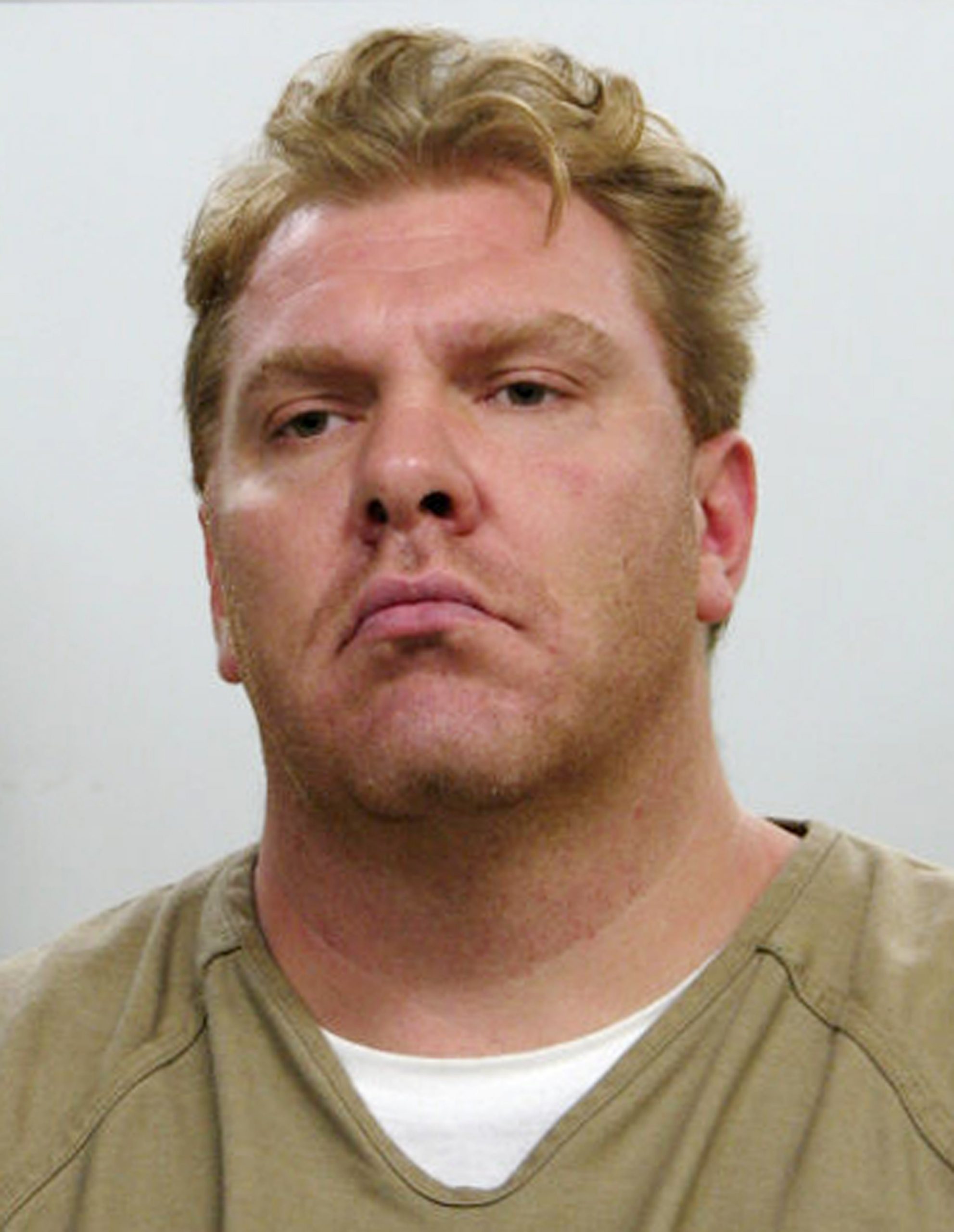 Jail inmate charged with trying to hire hit man