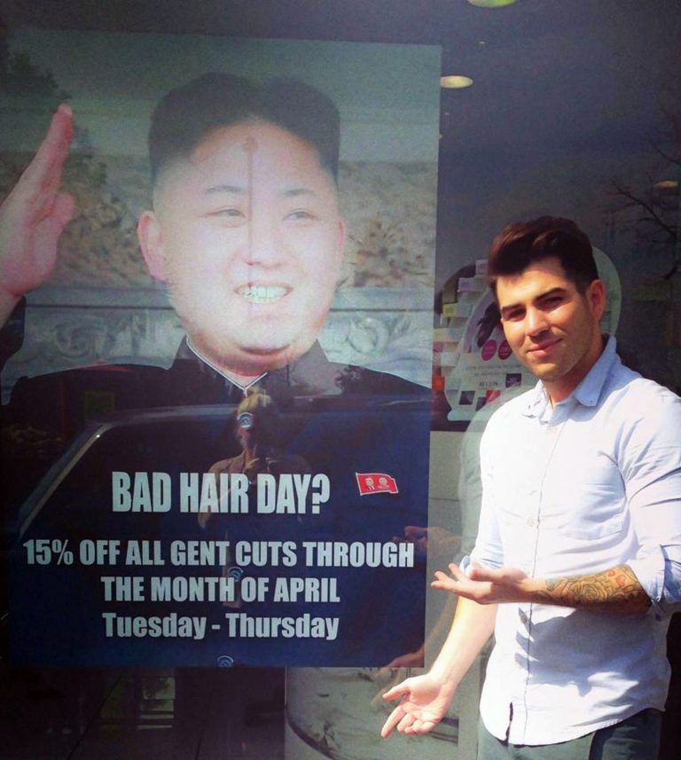 NKorea complains over barber’s Kim Jong Un poster