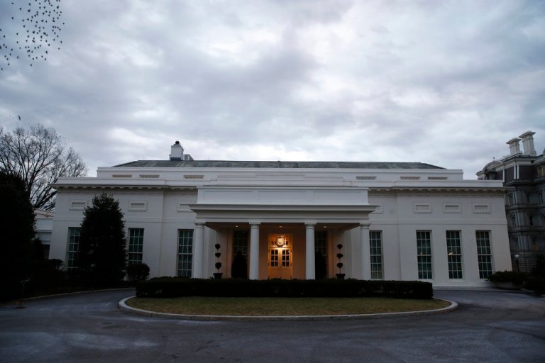 The West Wing of the White House is dark Sunday, Jan. 21, 2018, in Washington. (AP Photo/Alex Brandon)