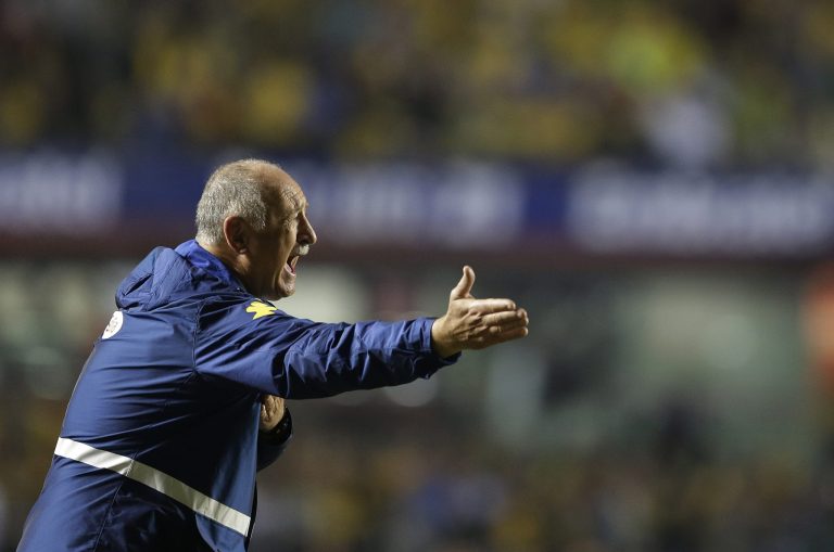 Brazil's Luiz Felipe Scolari coaches during a friendly soccer match against Serbia at the Morumbi stadium in Sao Paulo, Brazil, Friday, June 6, 2014. Brazil is hosting the World Cup soccer tournament that starts June 12. (AP Photo/Andre Penner)