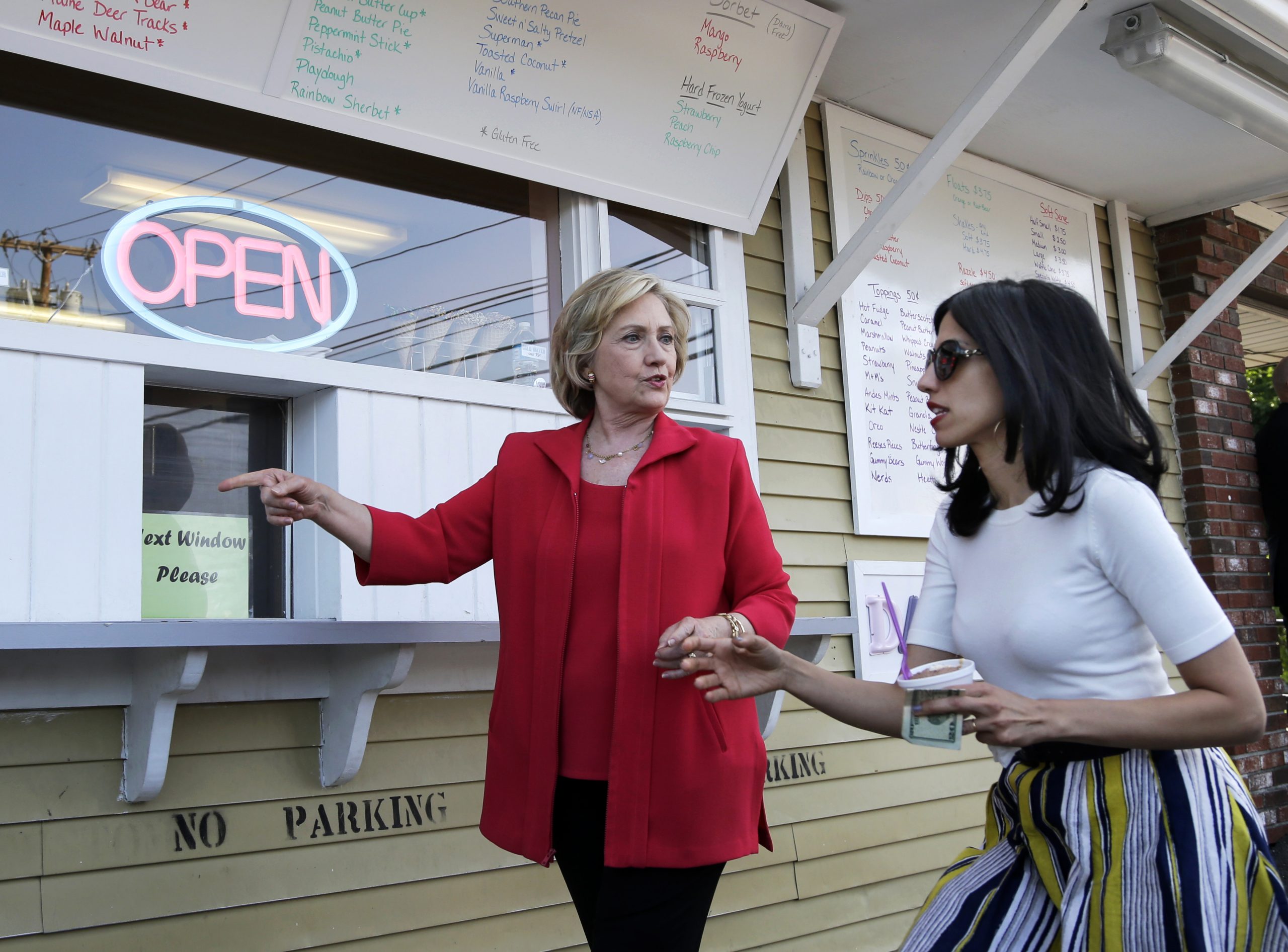 Multiple roles of Hillary aide raises questions